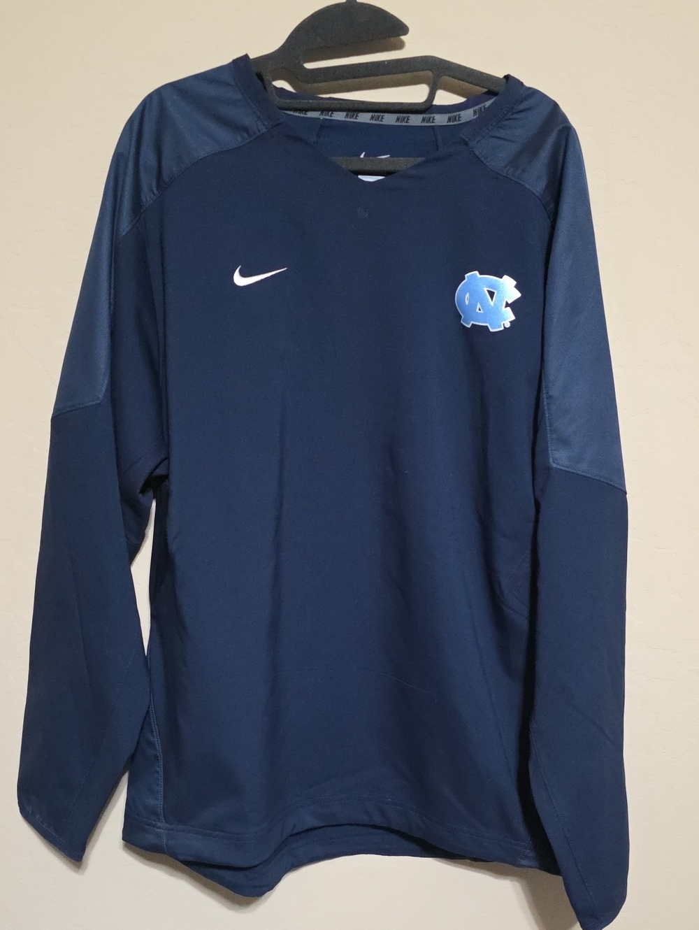 Nike navy long sleeve pullover with light blue UNC logo